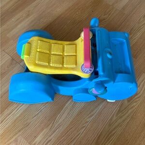 Bright Blue and Yellow Ride-On Toddler Car with Pink Steering